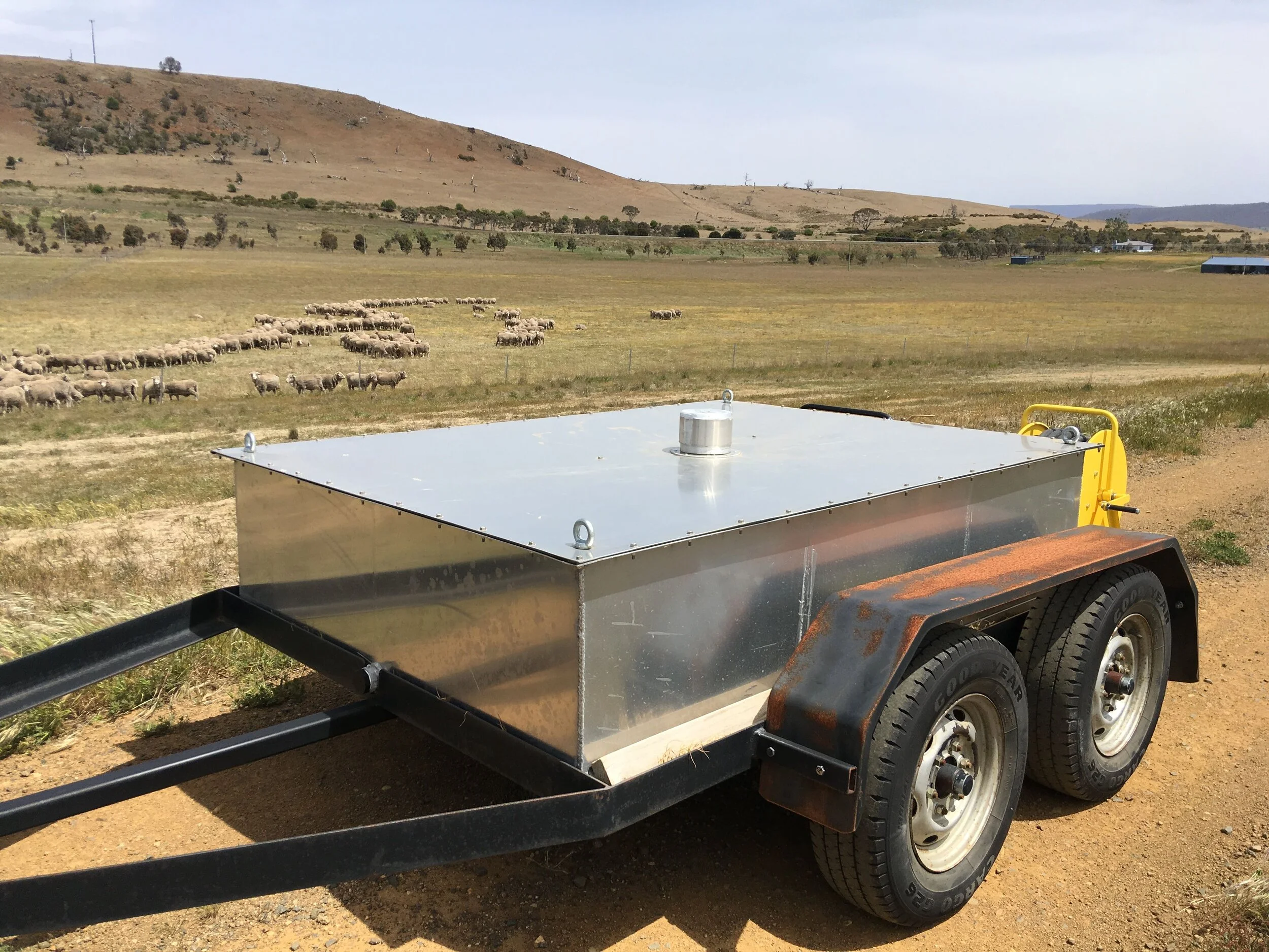My wonderful firefighting unit: 1500 litres (about 400 gallons) with its own dedicated trailer, pump, generator and fire hose. Comes in hand for watering baby trees, too.