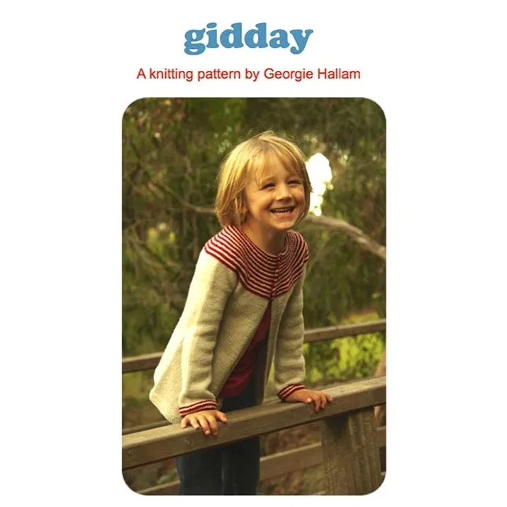 Gidday is a superbly simple cardigan. A striped garter stitch circular yoke is accentuated with cute buttons and a stocking stitch body.