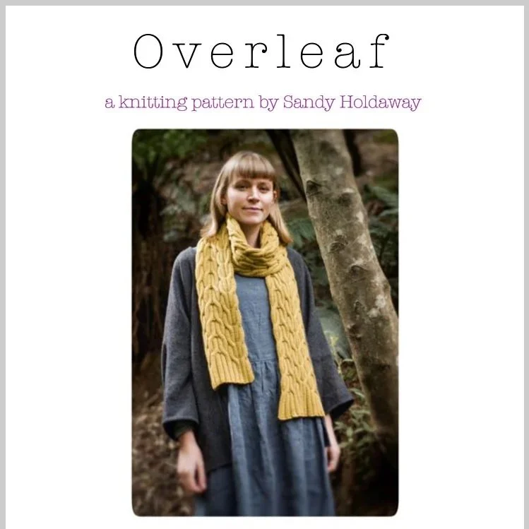 Overleaf is a fully reversible cabled scarf with no right or wrong side.
