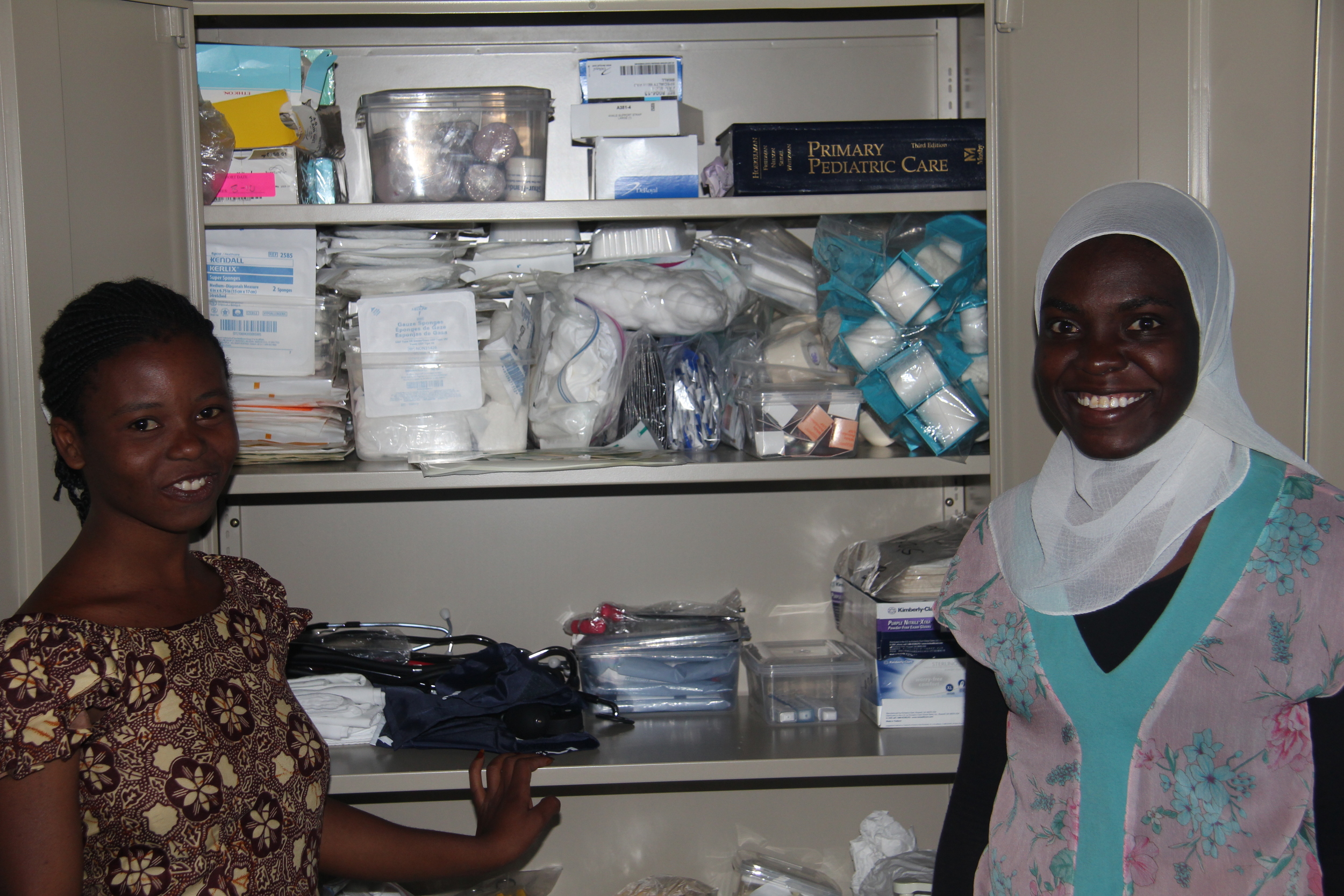Nurse Shameen & Dr. Nagome w_cupboard open.JPG