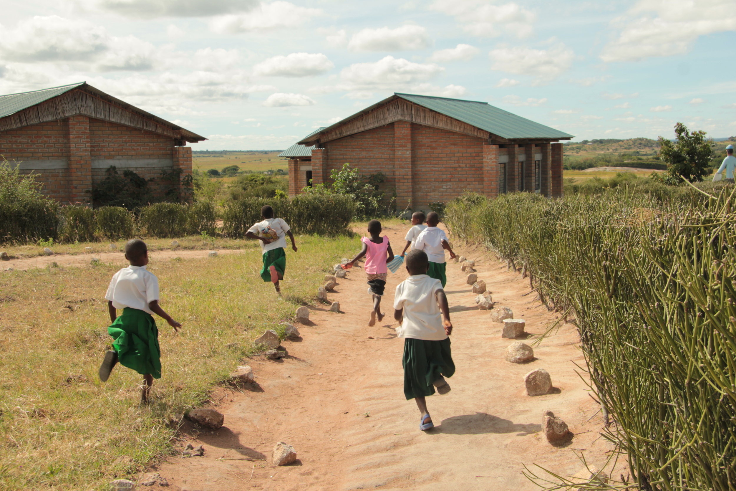 running to school Ntulya.JPG