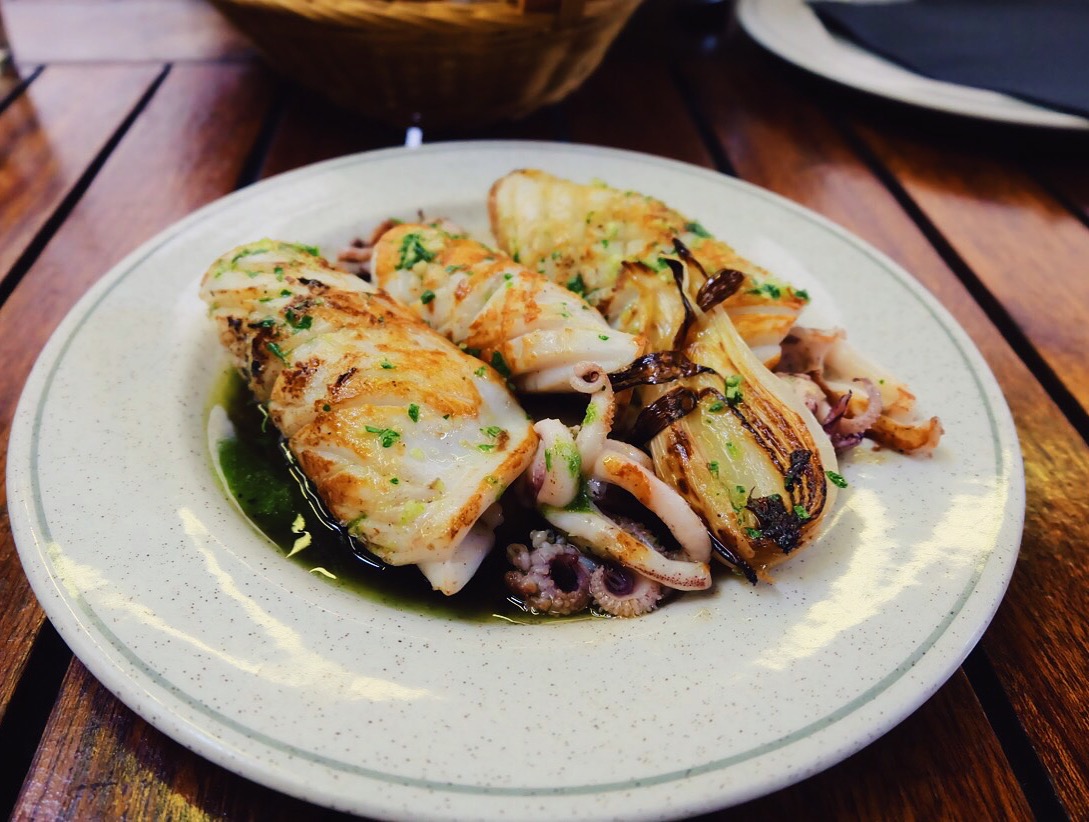 Local squid sautéed with garlic, parsley and sweet young onions confit. This was plain incredible !