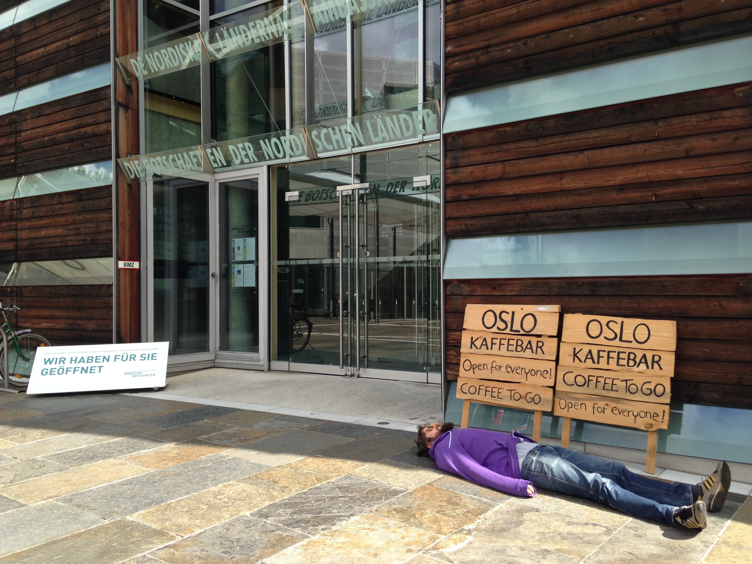 Nordic Embassies Berlin. Norwegian man performing a Cowboy stretch. 