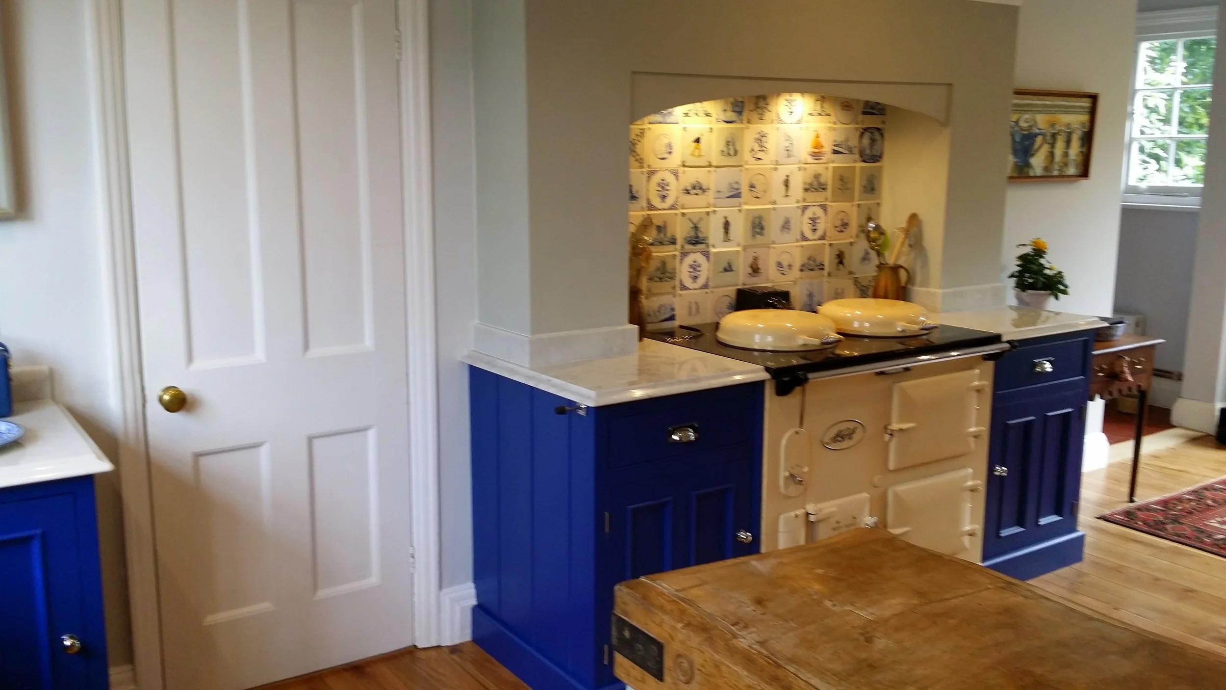 A dream kitchen handmade units and Aga