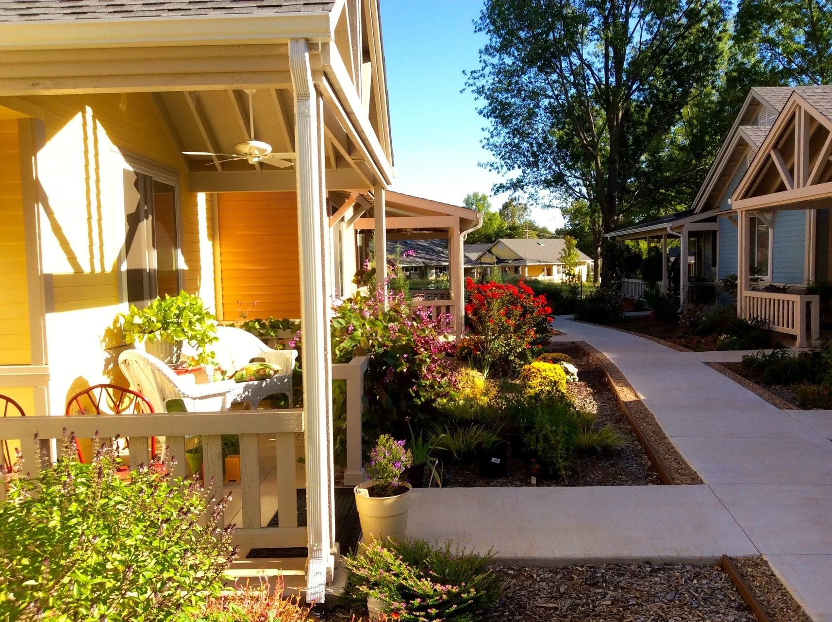 Oakcreek Community Senior Cohousing in Stillwater, OK is a good example of a neighborhood where people spend more time on their front porch talking with their neighbors than in their private home. It happens naturally, because the group works together to design their community based on the values they create as a team. 