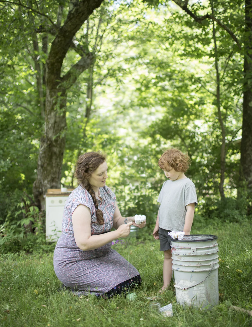 Jessica and Henry bind fabric for dyeing