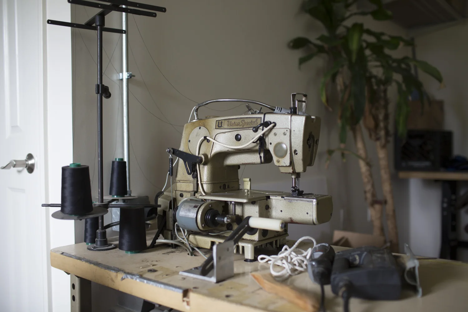 One of many vintage sewing machines in Renna's workshop