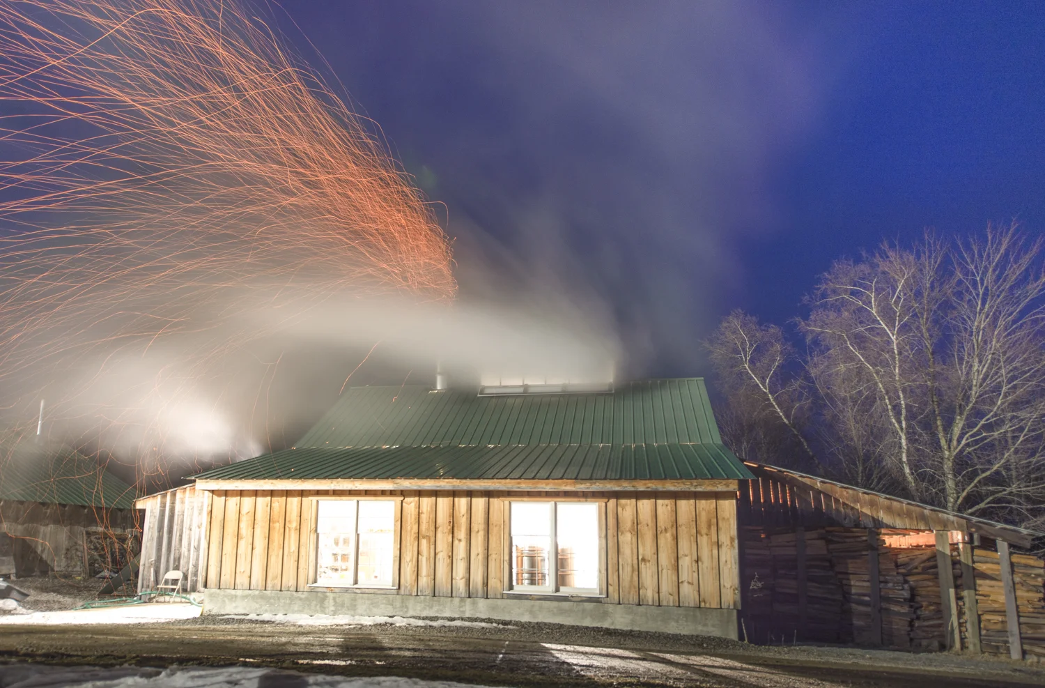 The sugarhouse at night.