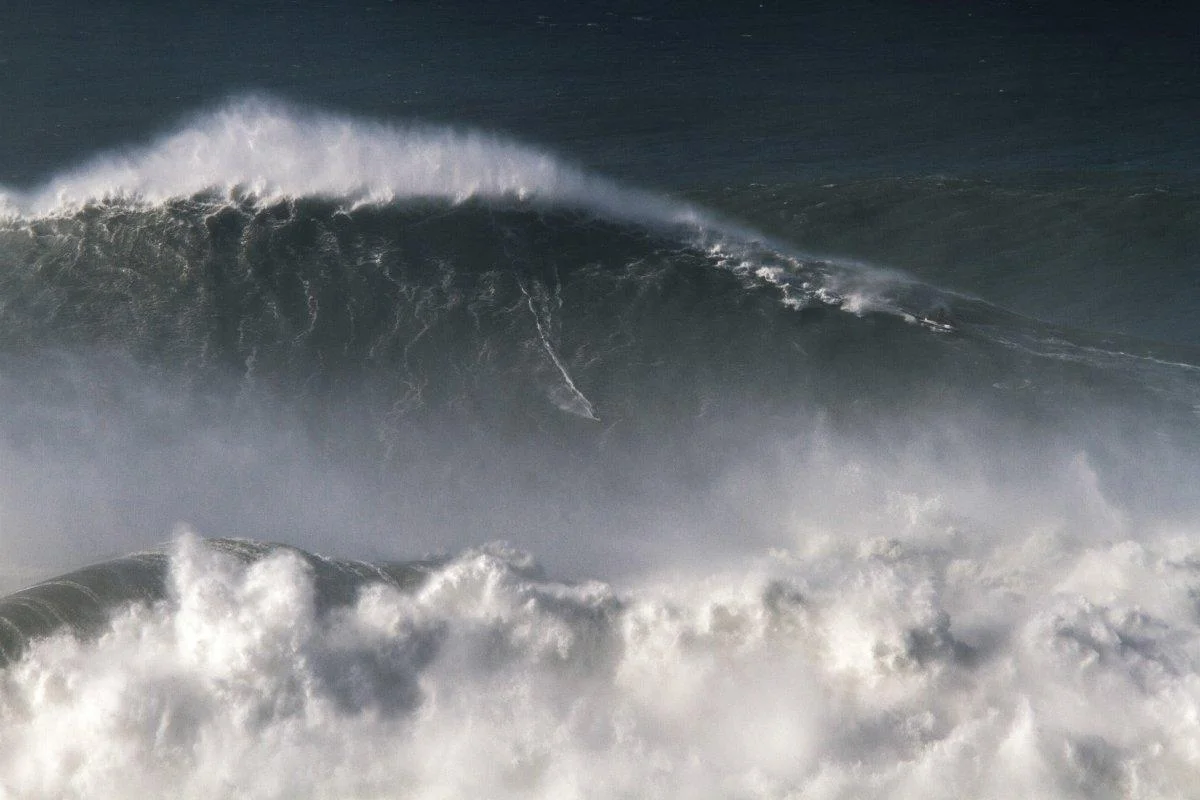 Surfer Rodrigo Koxa sets new world record riding 80-foot wave 