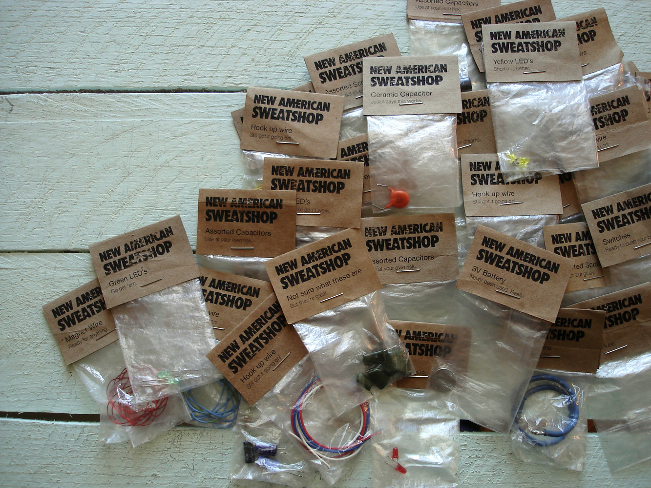 New American Sweatshop (detail), 2014, Repurposed paper, plastic, and electronics, 2 x 3.5 x 0.5 inches
