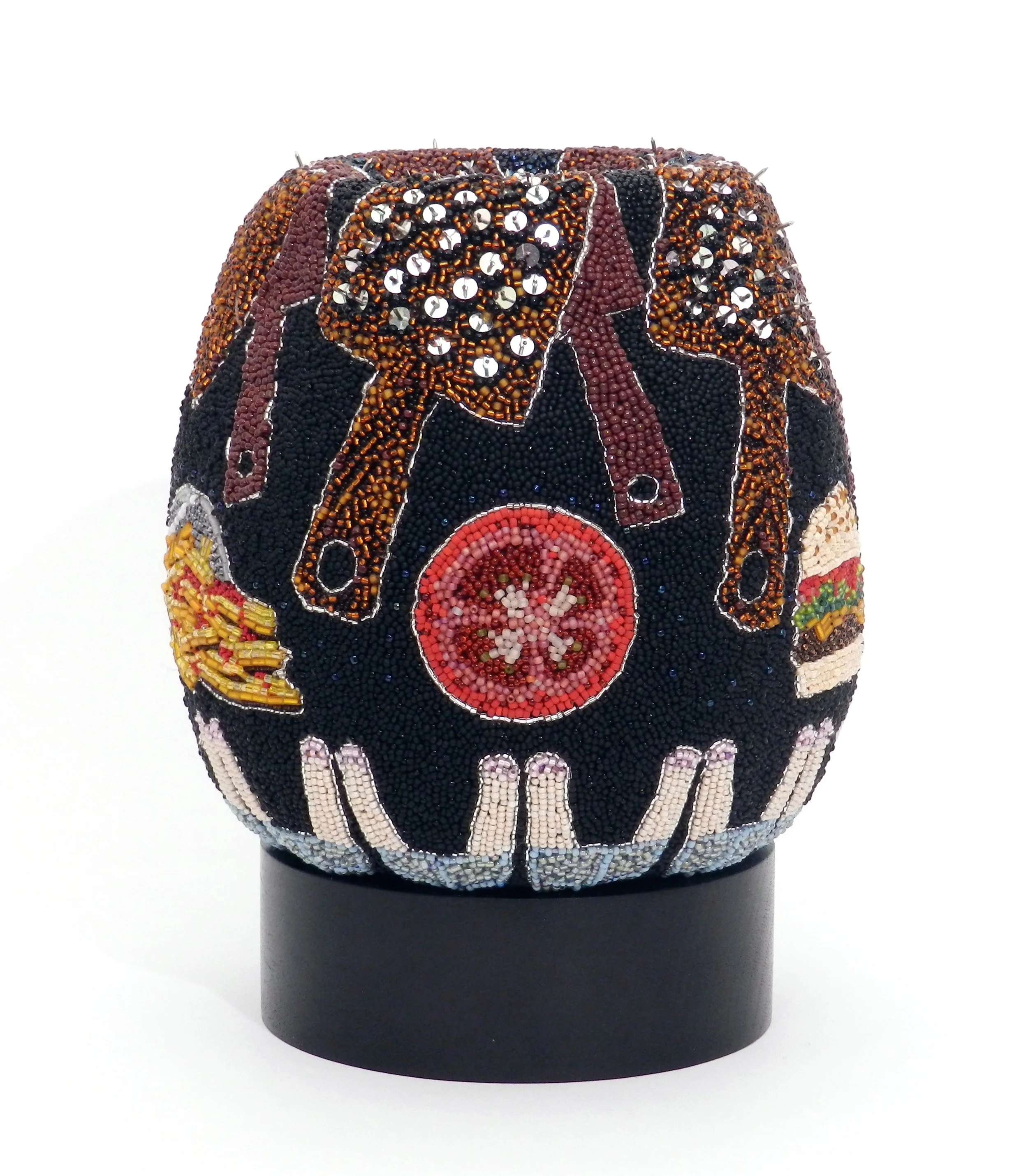 Stuffed , 2017, felt, glass beads, sequins, thumbtacks, 8.5 x 6.5 x 6.5 in.