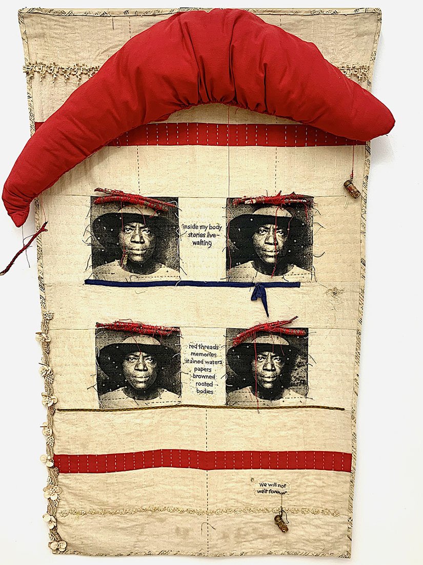   Inside My Body , 2022, screen print on plant-dyed osnaburg, cotton, cotton batting, sequin, glass bottles, glass beads, hand stitched text, lace trim, twigs, string, hand-quilted, 58”x32”x5” 