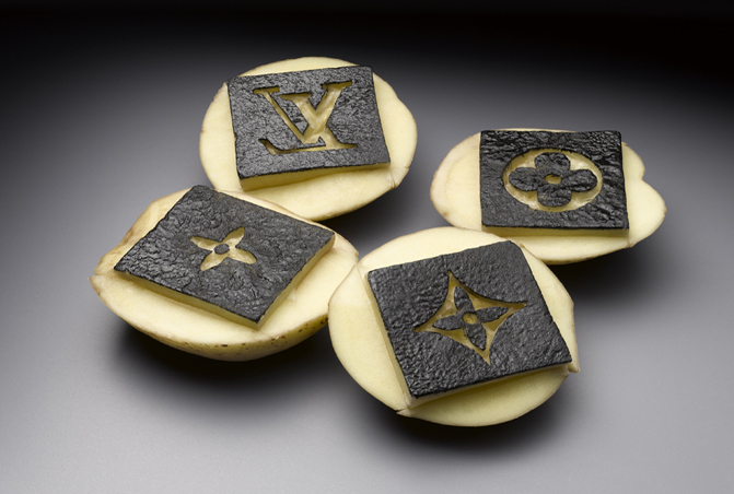 Yumi Janairo Roth, Potato Stamp Louis Vuitton , 2010. Archival print of carved potatoes