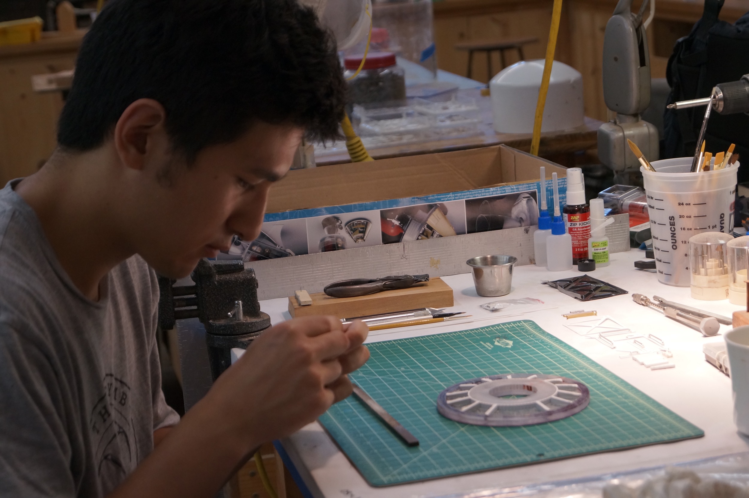 Luke Ban making models.
