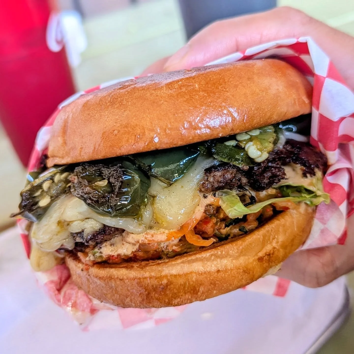 Celebrate National Cheeseburger Day your way!

Pictured is @willetcooks ' go-to spicy order: brioche bun, 5 ounce grilled patty, pepper jack cheese, charred jalape&ntilde;os, kimchi relish, lettuce, sambal mayo, and pickled habaneros.
