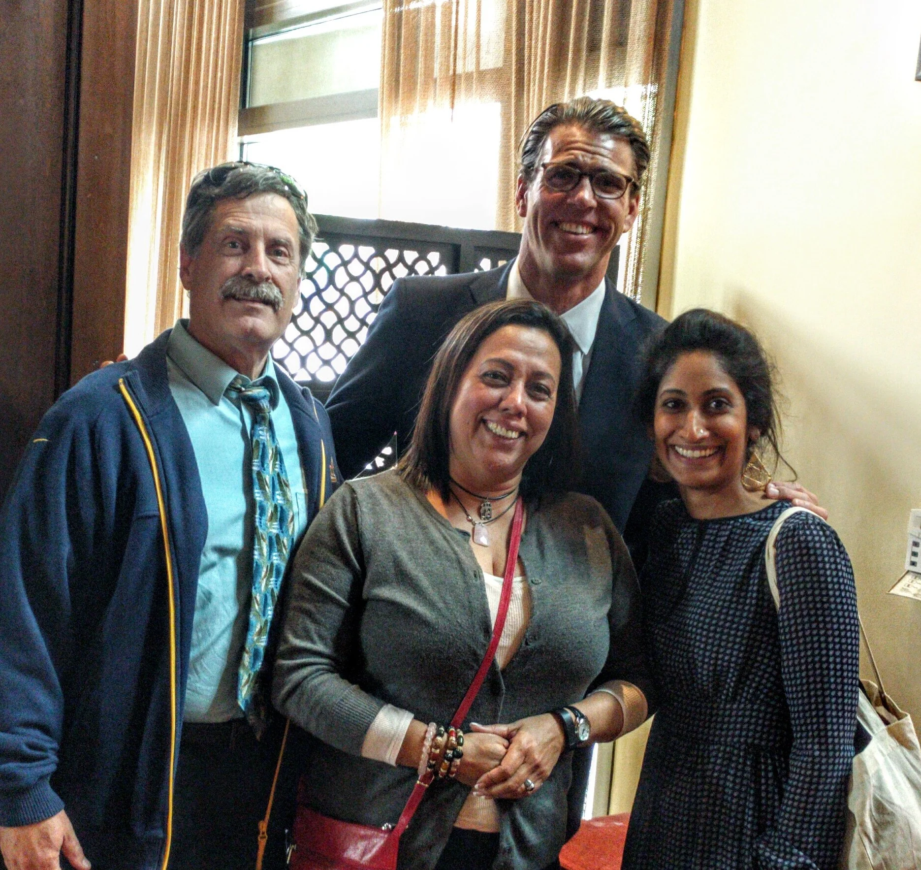 From Left to Right: Tim Dutra (Healthy Athletes Clinical Director for the Special Olympics of Northern California), Elena Sanchez (Adjunct Faculty at the California School of Podiatric Medicine), Gary Jall Jr. (Olympian)., and Ajitha Nair (me)