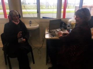 Aunty Norah Bradley with the installation of a shaker alarm