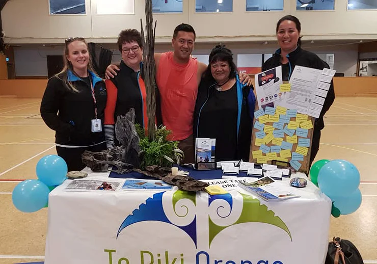 Rob Mokaraka with Te Piki Oranga kaimahi Amber Ford, Karen Davidson, Alice Adair and Lydia Mains
