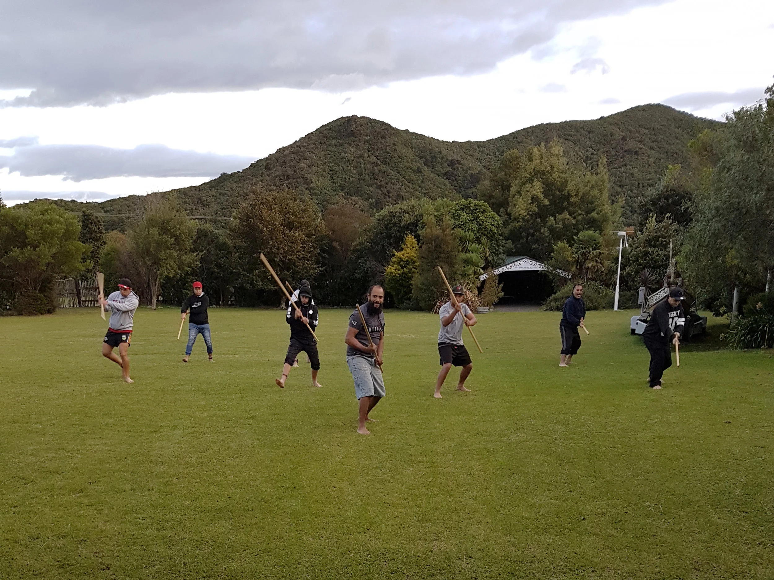 Eugene Wikitera in the middle led the mau rākau/taiha