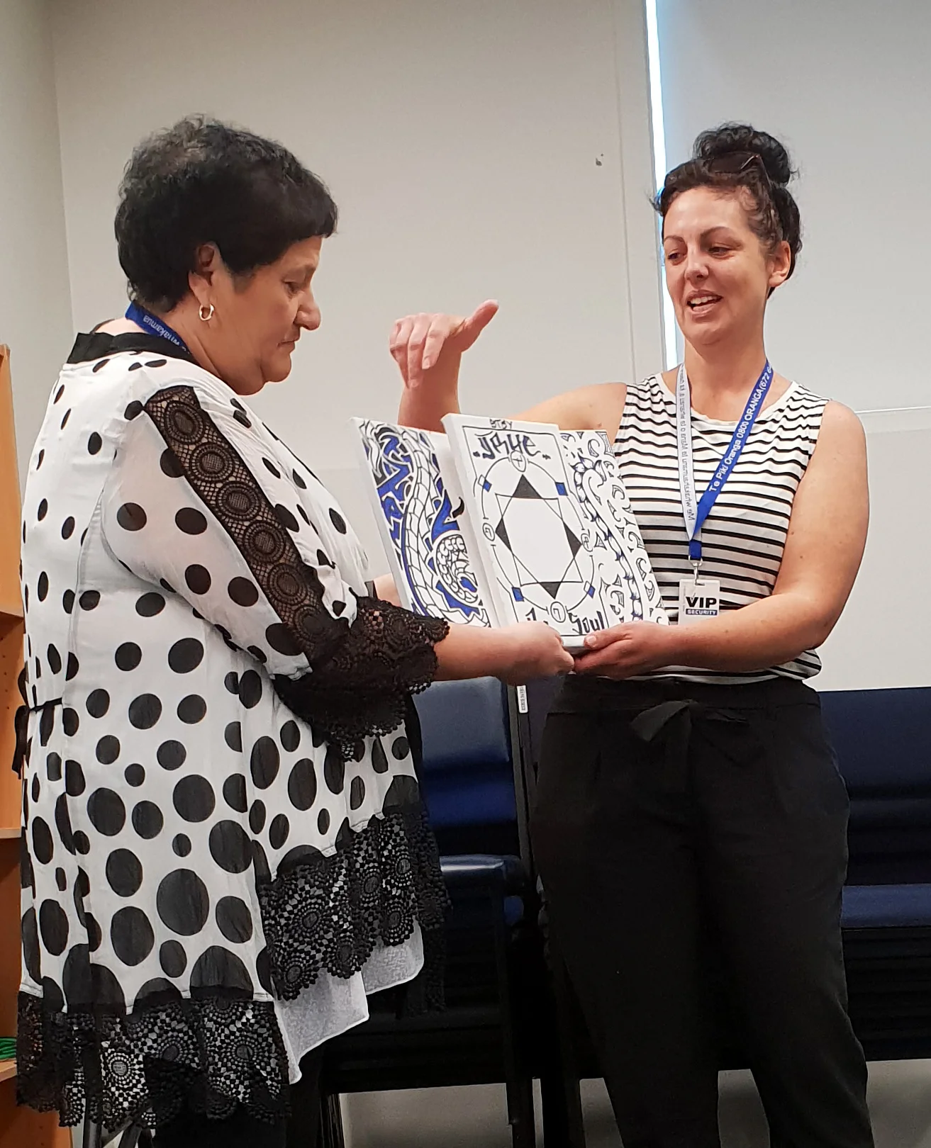 Betty Soane and Melissa Linton presenting one of Te Pae Oranga success story at the AGM