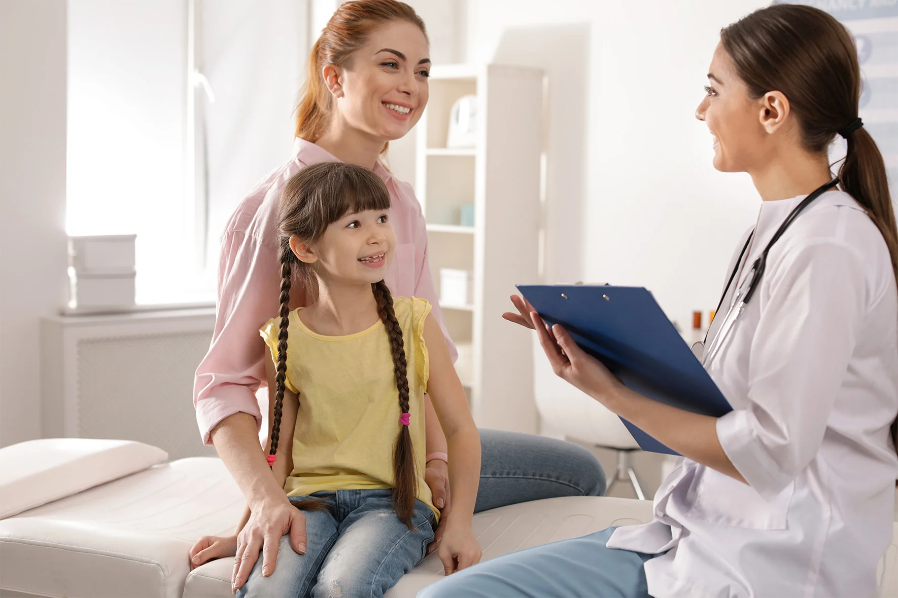Mother-with-child-visiting-doctor-in-hospital-1.jpg