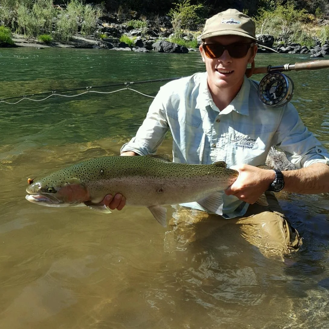 Andrew Rossow with the prize. This summer run buck fell prey to a skated fly on the Trinity River. Photo: Colton Schwenning