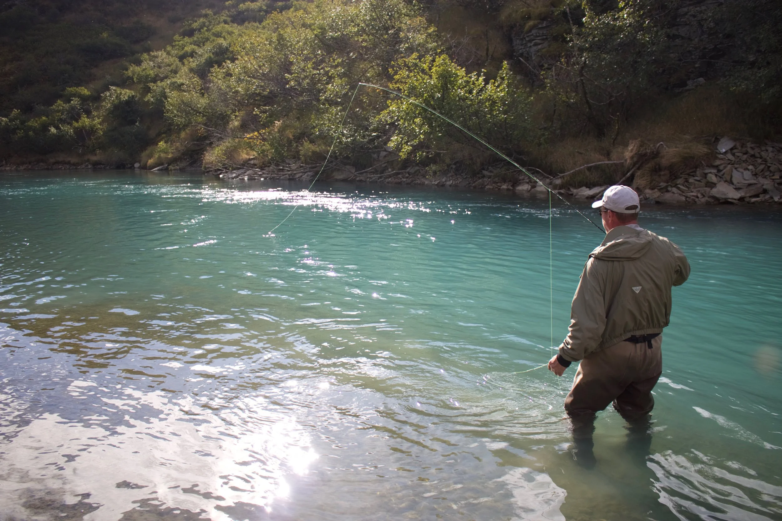 Rob fishing a deep pool hoping for a grab. The heavy stain obscuring any fish that might be holding only added to the mystery
