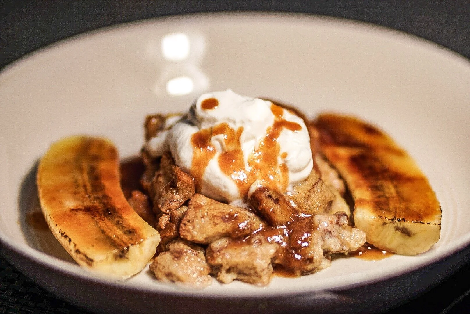 Banana Bread Bread Pudding Torched Banana Spears Vanilla Whipped Cream & Whiskey Caramel Sauce