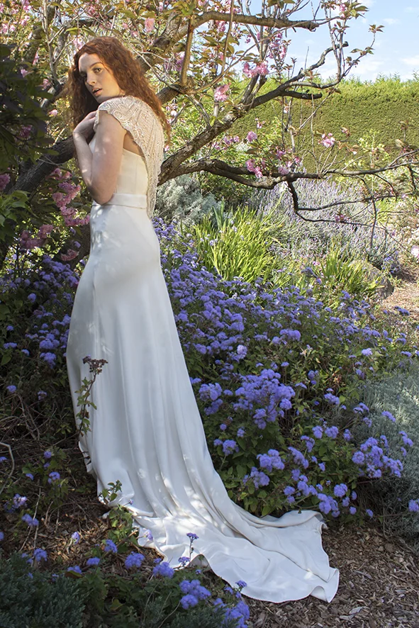 AIDA - Silk crepe de chine with hand beaded flesh toned attached cape size 6 to 8 Colour: Bone/Flesh