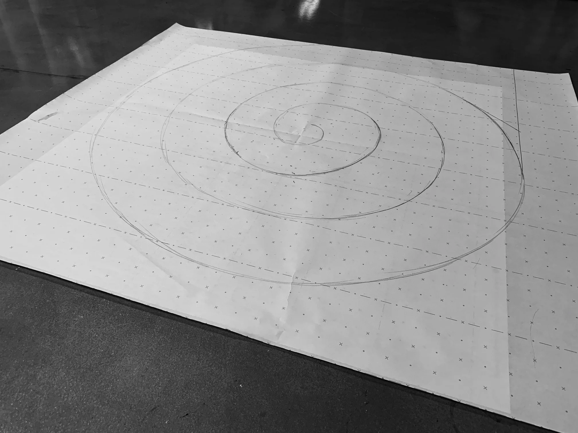 Pattern cutting an escargot shape to create billowing textural shapes.