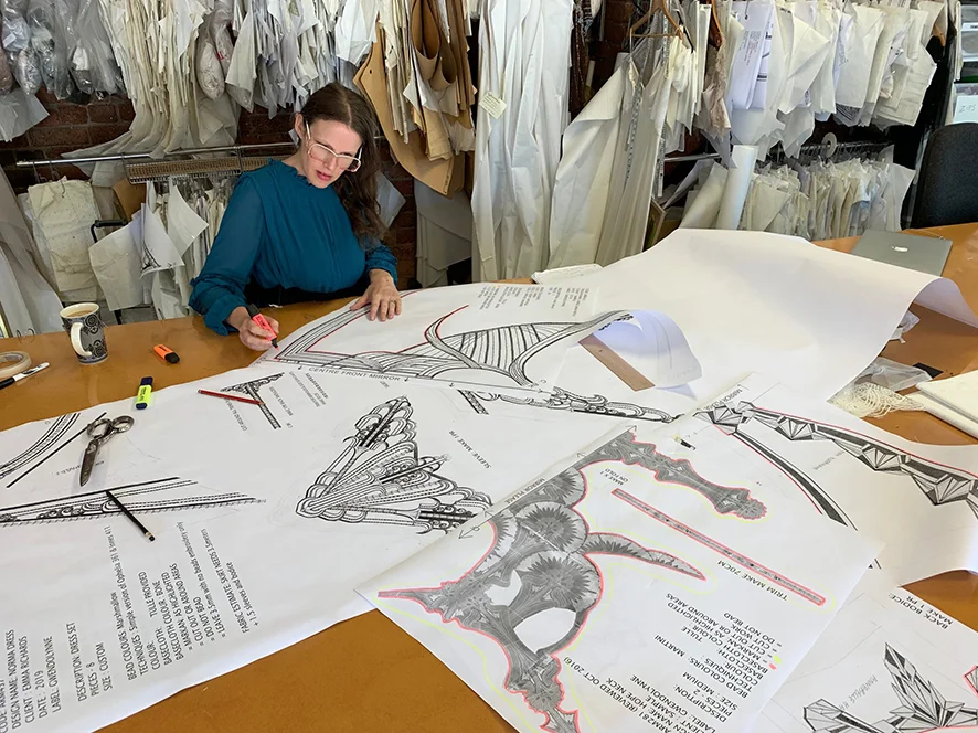 Busy creating pattern layouts for custom gowns in the studio above our boutique.