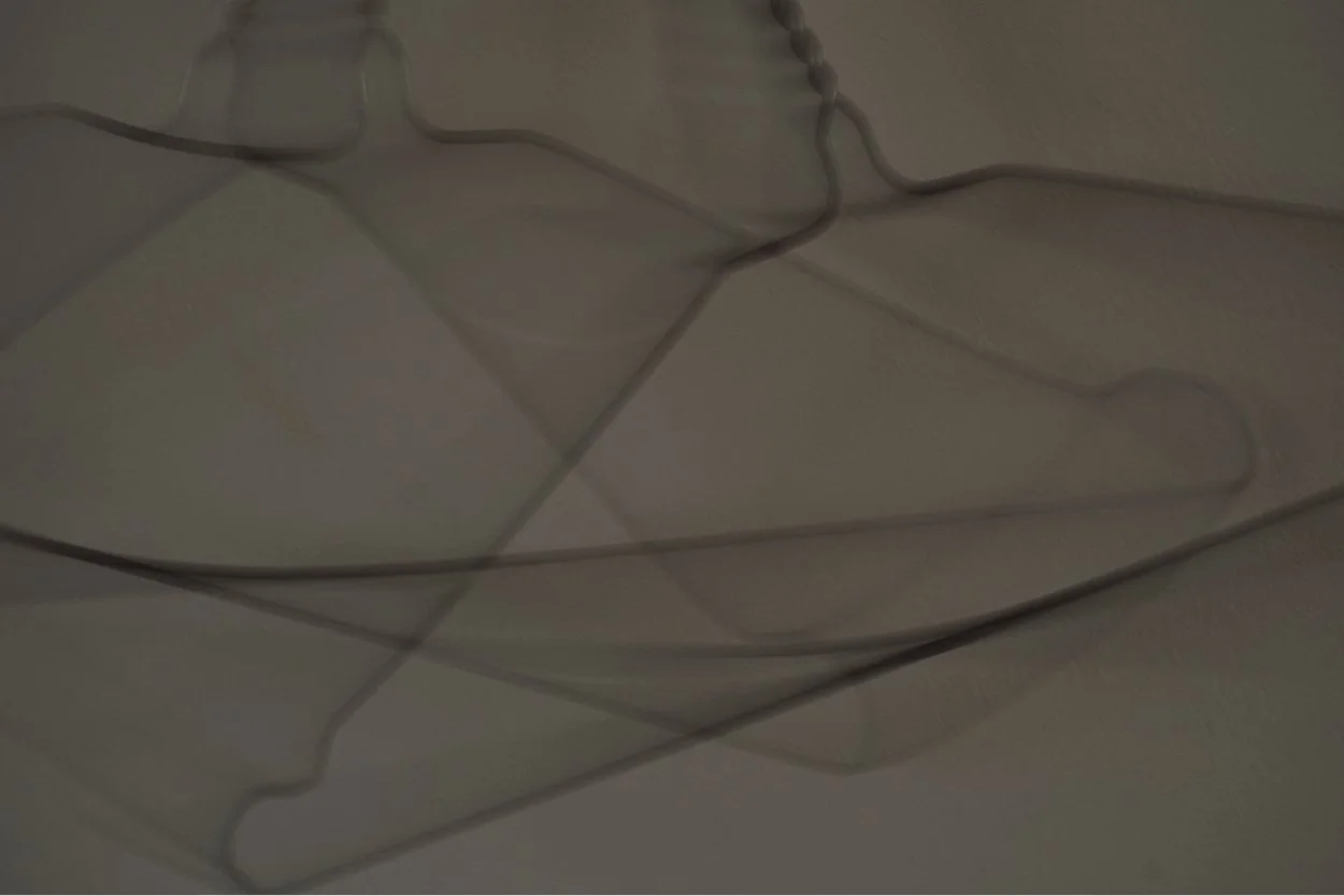 the coathangers in mimi's hall