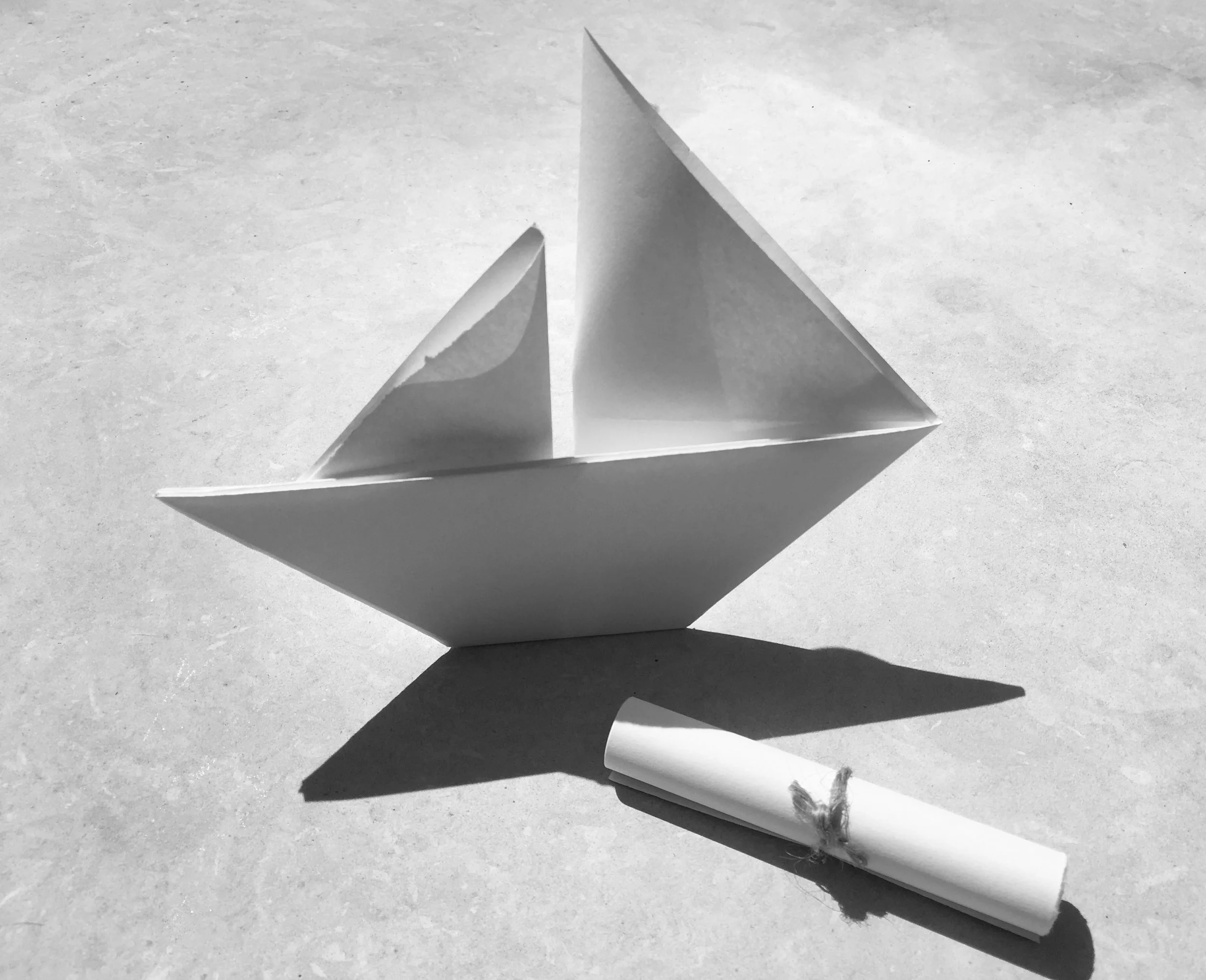  Paper origami boat and message scroll 