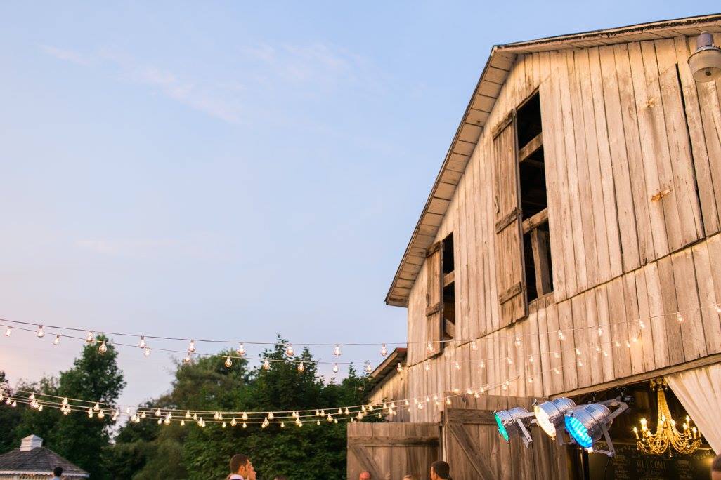 Side view of the barn with the lights over the dance floor!