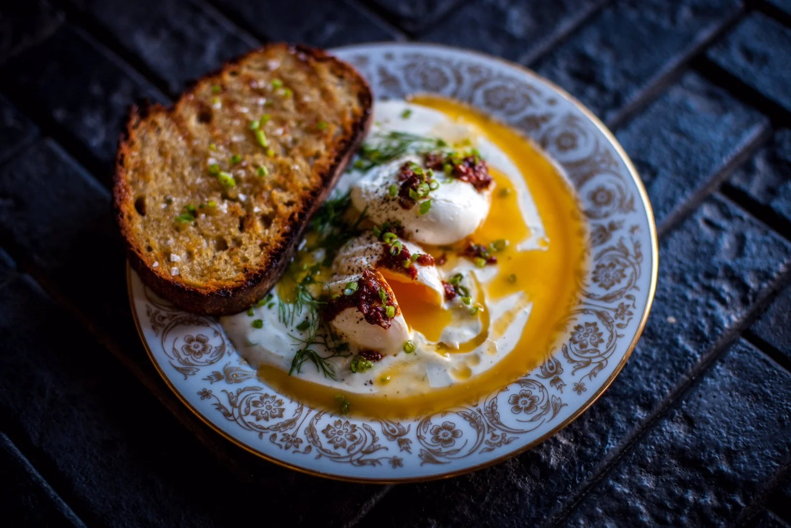Poached eggs with yoghurt and chipotle butter. 