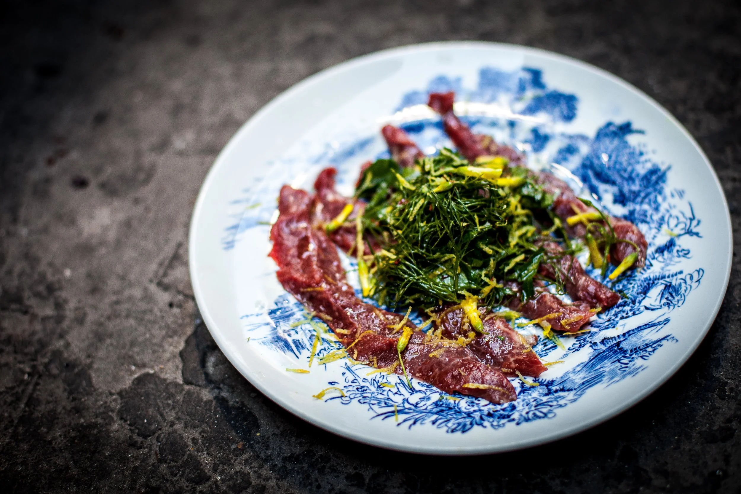 Flatiron crudo with parsley, fennel and wild sorrel flowers