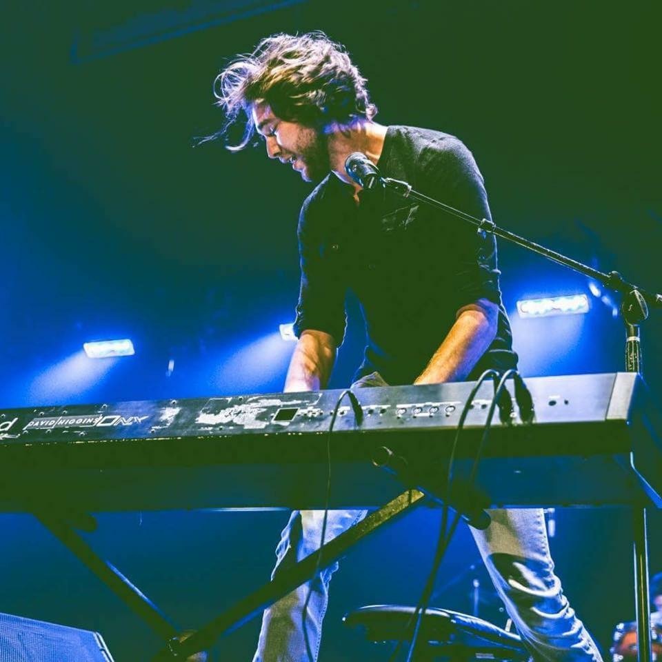 David Higgens performing on keyboard piano