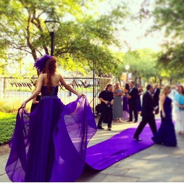 'Red Carpet' that is the color purple and turns into a taller than average performer and her long purple dress