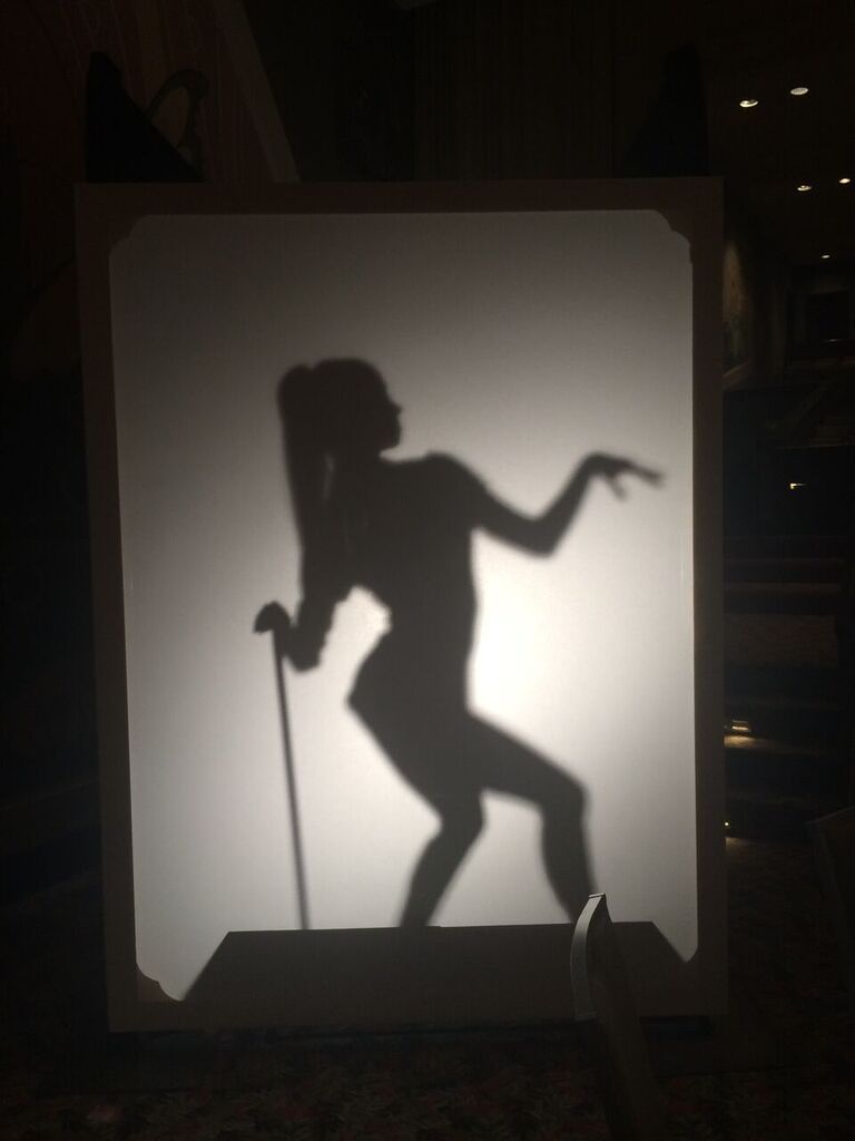 Black and white colored shadow box dancer with a cane