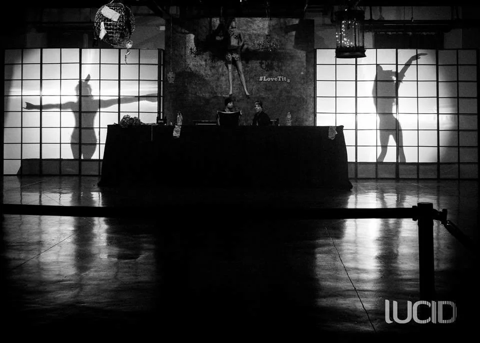 Black and white shadow box dancers at a James Bond themed event