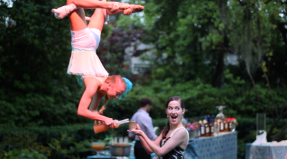 White Costumed Trapeze Aerial Bartender at Outdoor Event