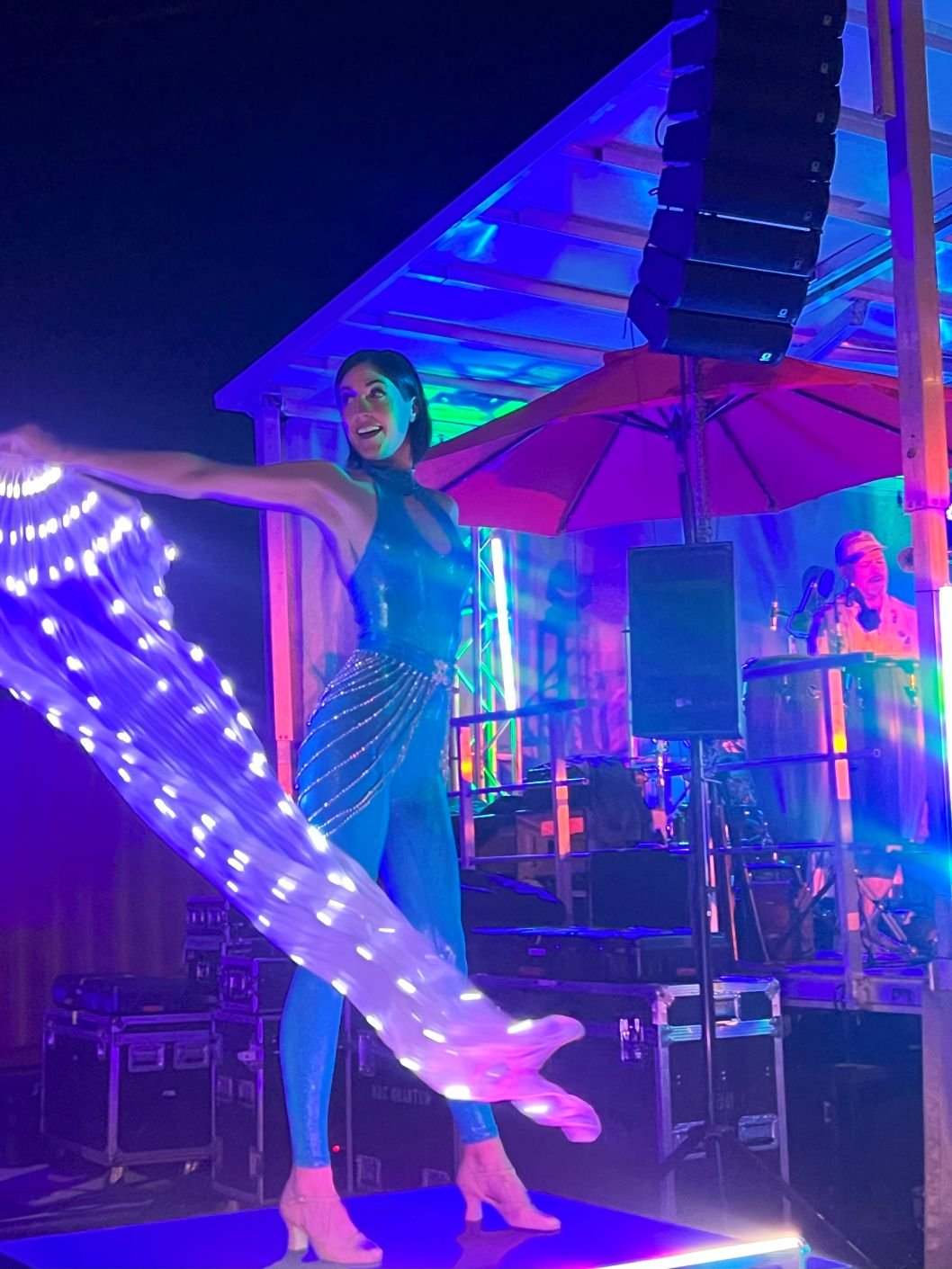 LED Fan Go-Go Dancer in Blue Unitard on Platform in Charleston