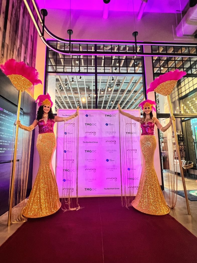 Gold and Pink Grand Entrance Duo at an Upscale Event
