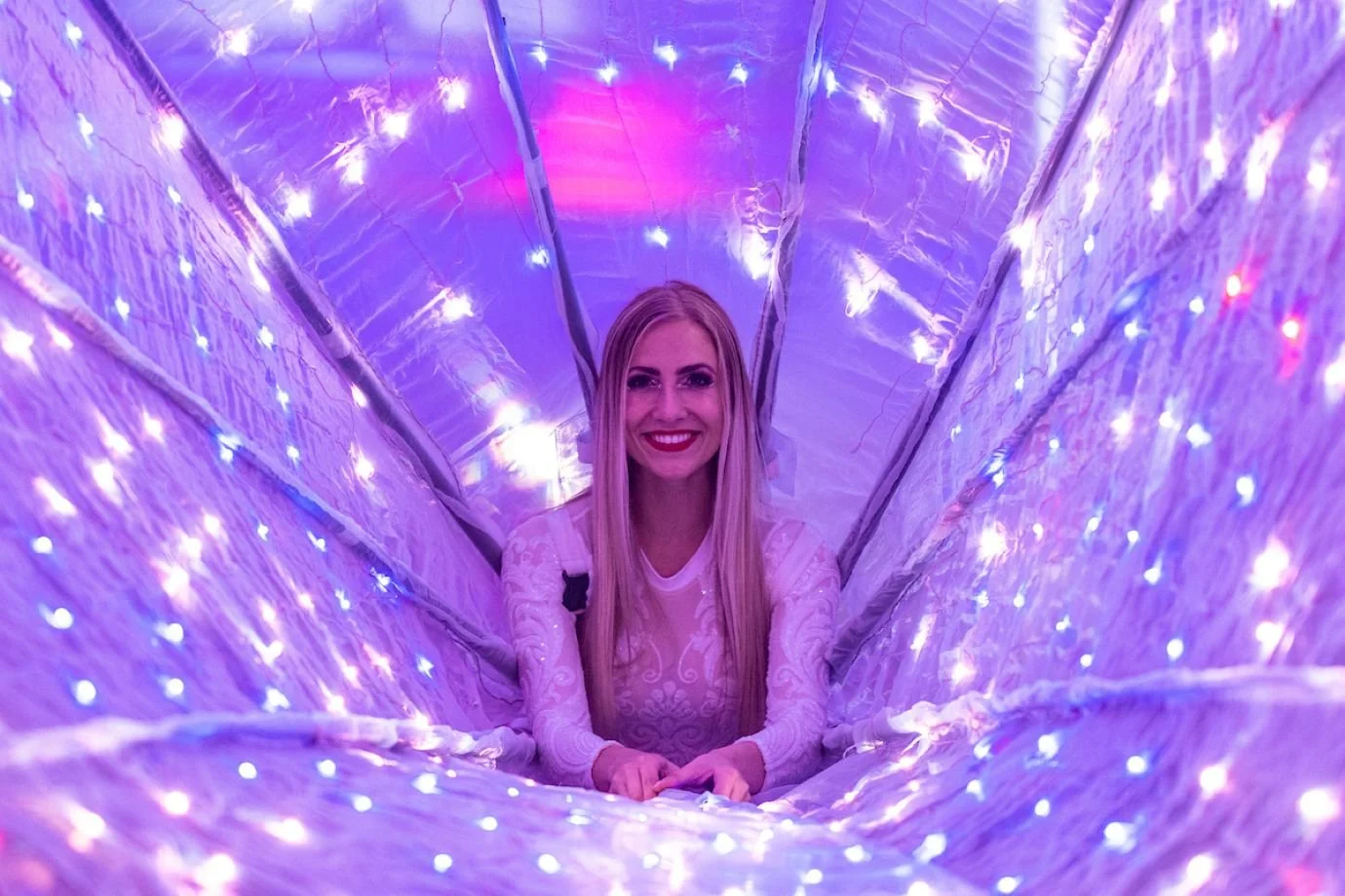 Close-Up LED Peacock Performer Wrapped in Light