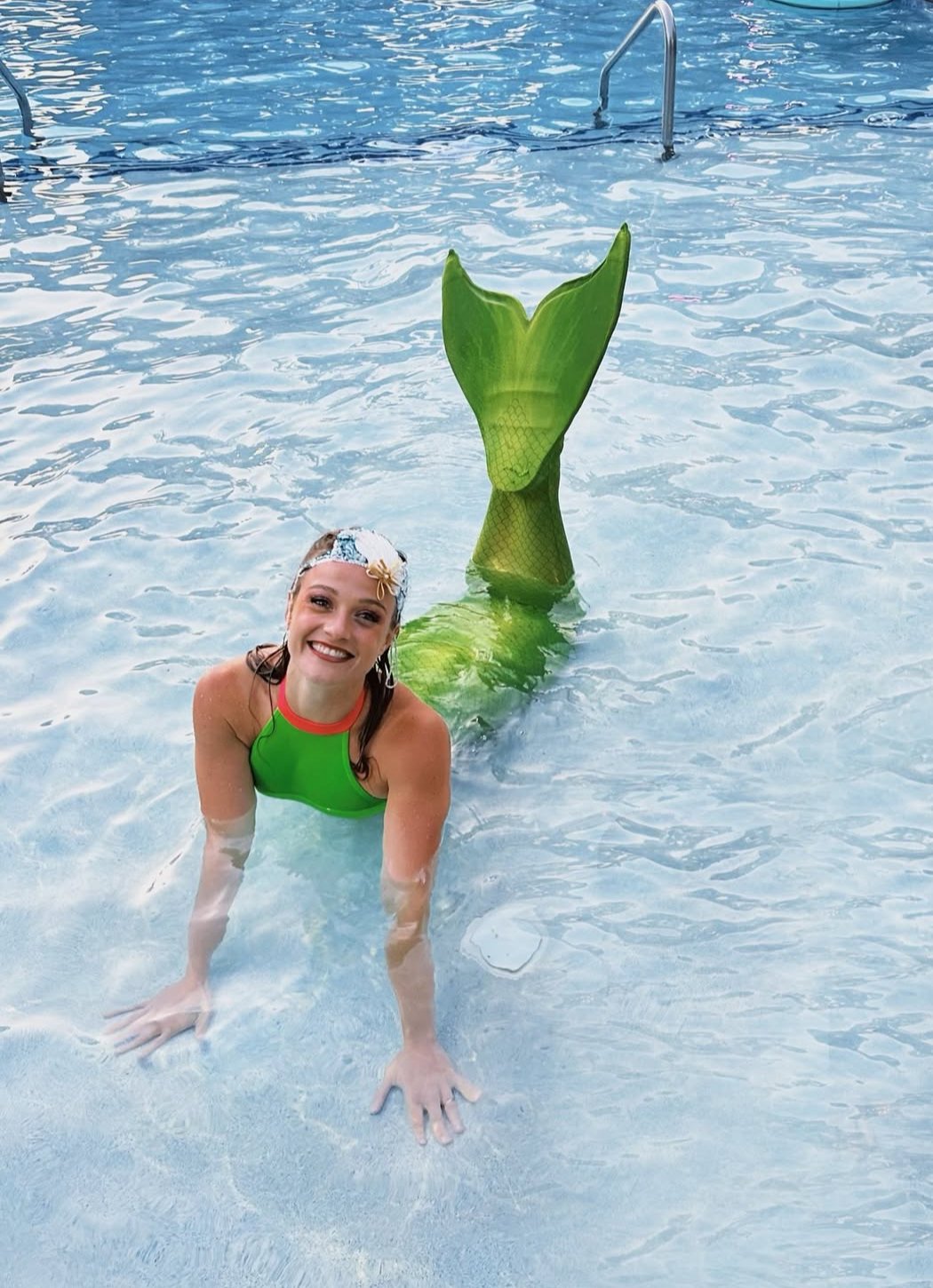 Green Mermaid in Shallow Pool