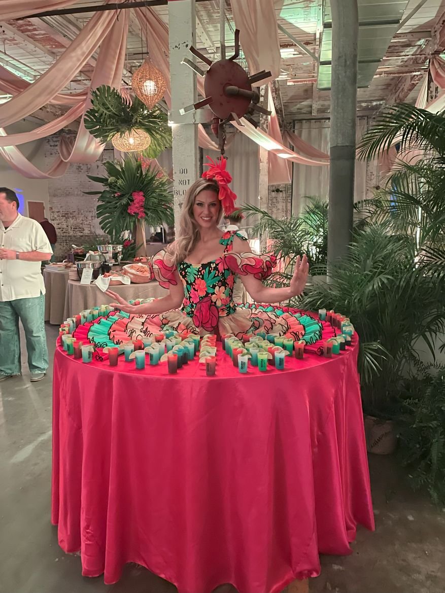 Tropical Pink Living Table with Floral Accents and Fruity Shots