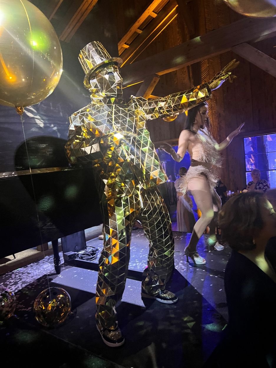 Gold Mirror Man and Go-Go Dancer