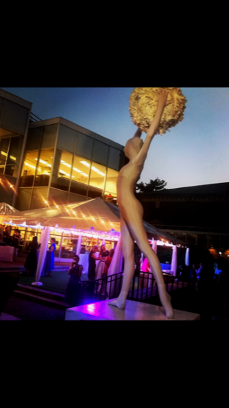 Flower Ball Performer at Outdoor Evening Celebration