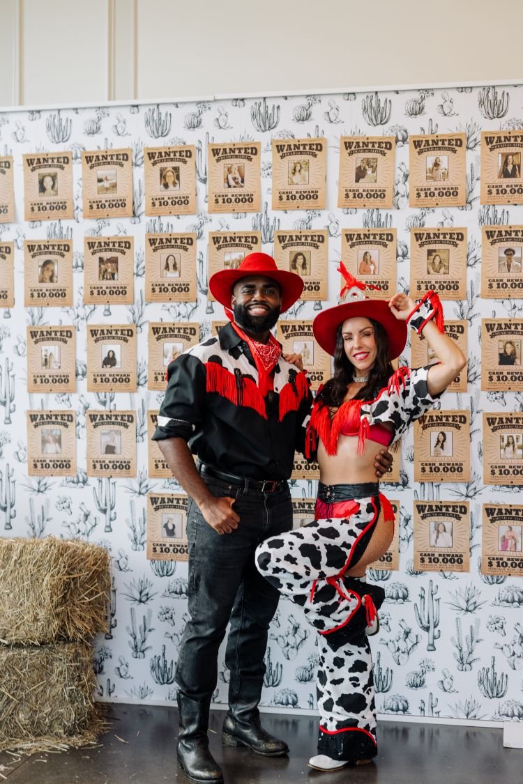 Country Dance Duo Posed at Themed Photo Op
