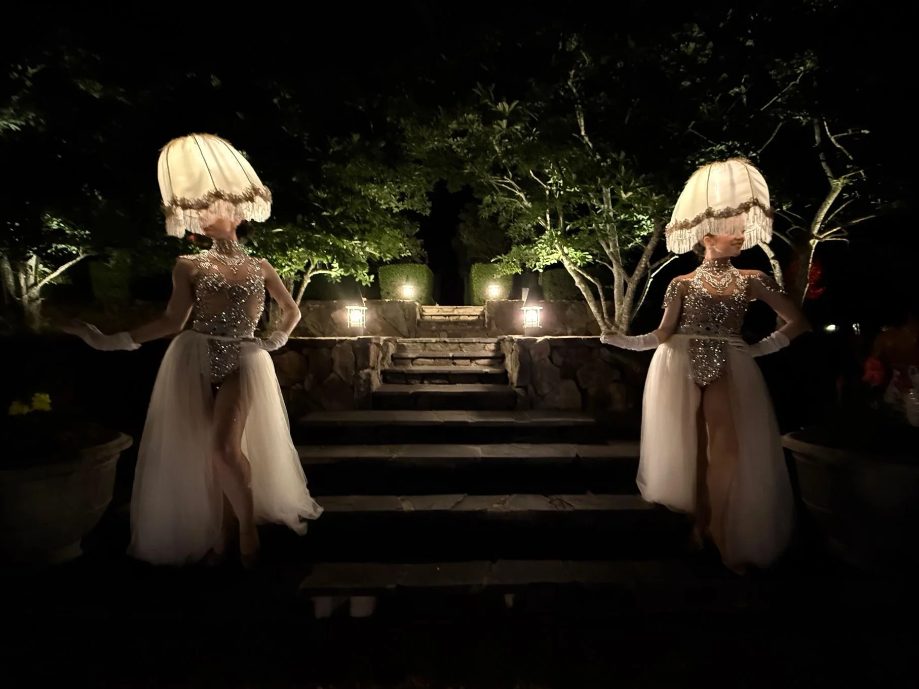 Living Luminaries Welcoming Guests to Secret Garden Experience